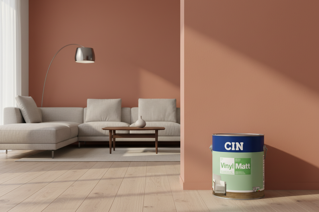 Sala moderna com parede de cor terracota mate e lata CIN Vinylmatt em destaque